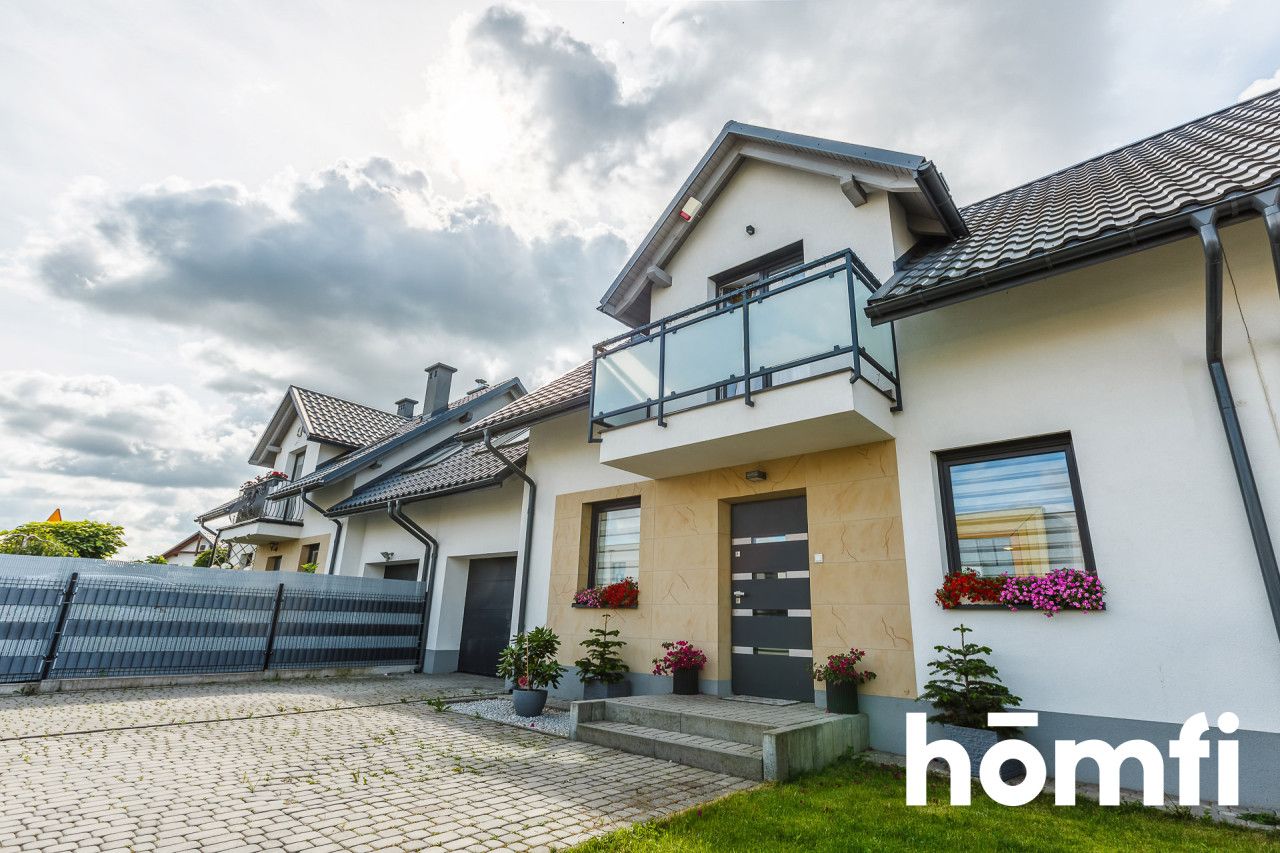 DOM W ZABUDOWIE SZEREGOWEJ O POW. 220 M² Z GARAŻEM I OGRÓDKIEM - Dom - Sprzedaż - Rzeszów, Wilkowyja