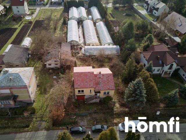 A spacious house with a garden, a well, and a garage. - Дім - Продаж - Zamość
