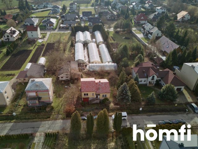 A spacious house with a garden, a well, and a garage. - Дім - Продаж - Zamość