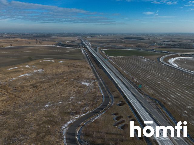 DZIAŁKA INWESTYCYJNA PRZY WĘŹLE KOMUNIKACYJNYM - Działka - Sprzedaż - Gnieźnieński, Łubowo / Woźniki