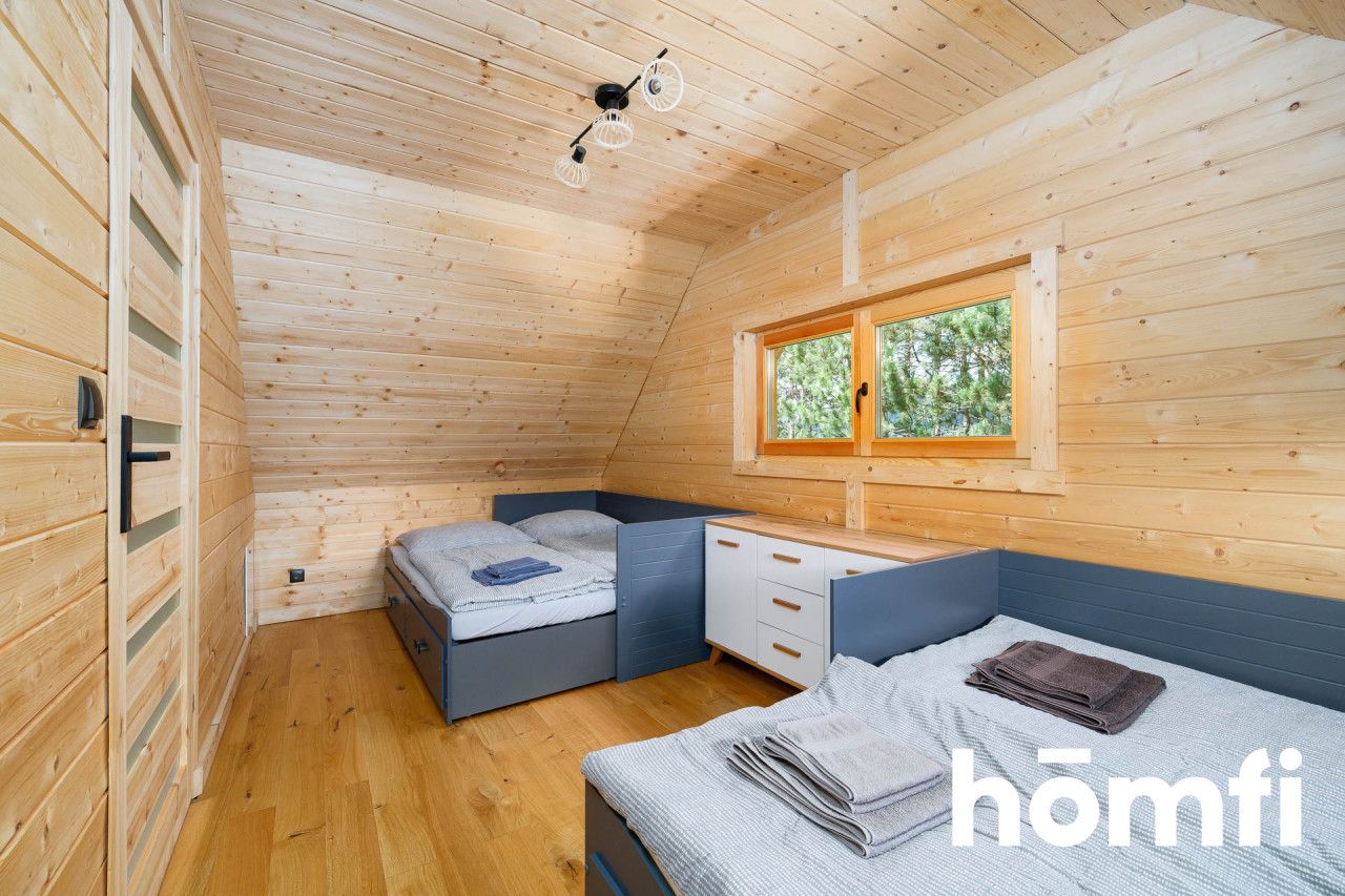 A charming, year-round wooden house for sale on a large, 45-are plot surrounded by meadows, forests, and fields! Ideal as a getaway from the city or for tourist rental (currently functioning in short-term rental - rating 9.9/10 on booking) | Skrzydlna | Dobra commune | Limanowa county. - House - Sale - Limanowski, Dobra / Skrzydlna