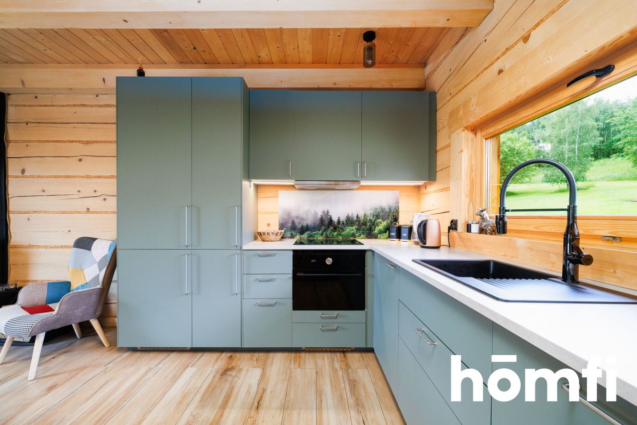 A charming, year-round wooden house for sale on a large, 45-are plot surrounded by meadows, forests, and fields! Ideal as a getaway from the city or for tourist rental (currently functioning in short-term rental - rating 9.9/10 on booking) | Skrzydlna | Dobra commune | Limanowa county. - House - Sale - Limanowski, Dobra / Skrzydlna