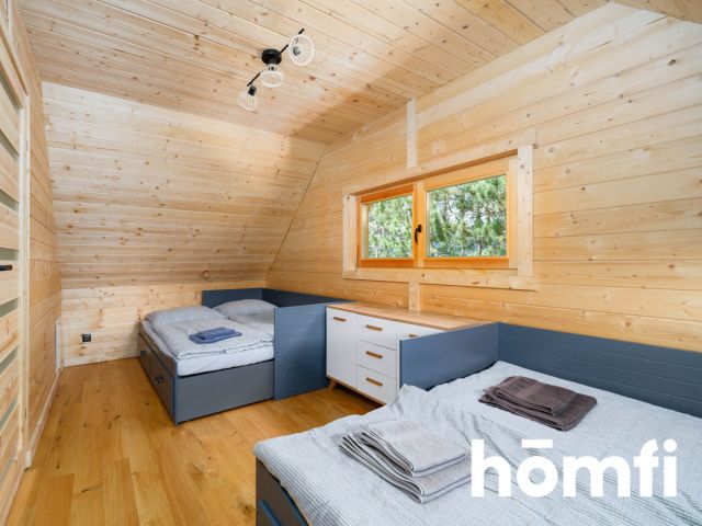 A charming, year-round wooden house for sale on a large, 45-are plot surrounded by meadows, forests, and fields! Ideal as a getaway from the city or for tourist rental (currently functioning in short-term rental - rating 9.9/10 on booking) | Skrzydlna | Dobra commune | Limanowa county. - House - Sale - Limanowski, Dobra / Skrzydlna