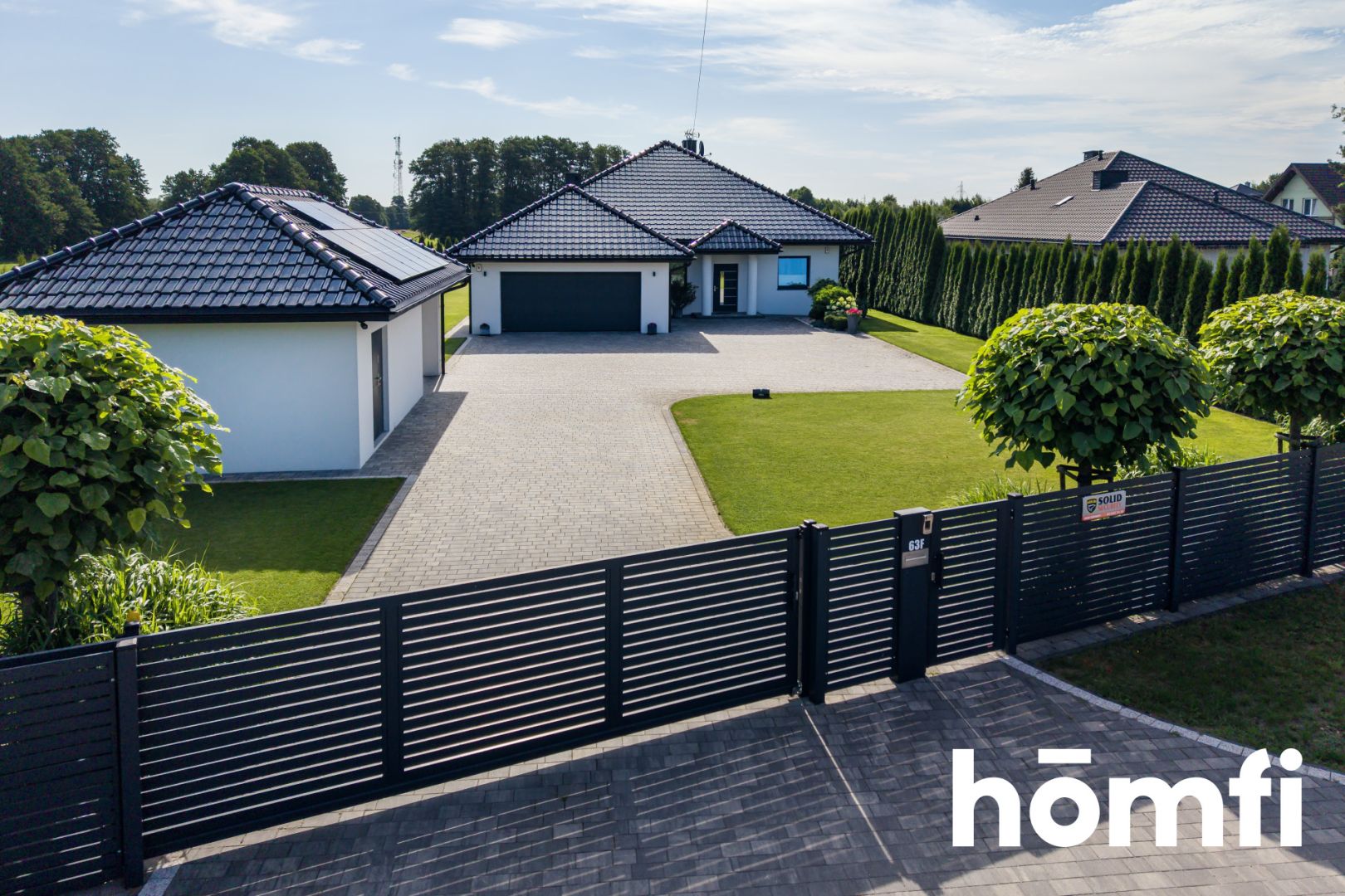 House for Sale in Bełchatów – Modern Detached Home with a Large Plot, Garage and Solar Panels - House - Sale - Bełchatowski, Bełchatów / Zawady