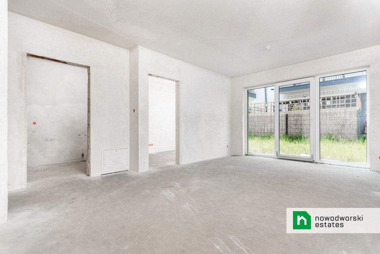 Mieszkanie w stanie deweloperskim z ogrodem na sprzedaż - Zielonki - Mieszkanie - Sprzedaż - Krakowski, Zielonki