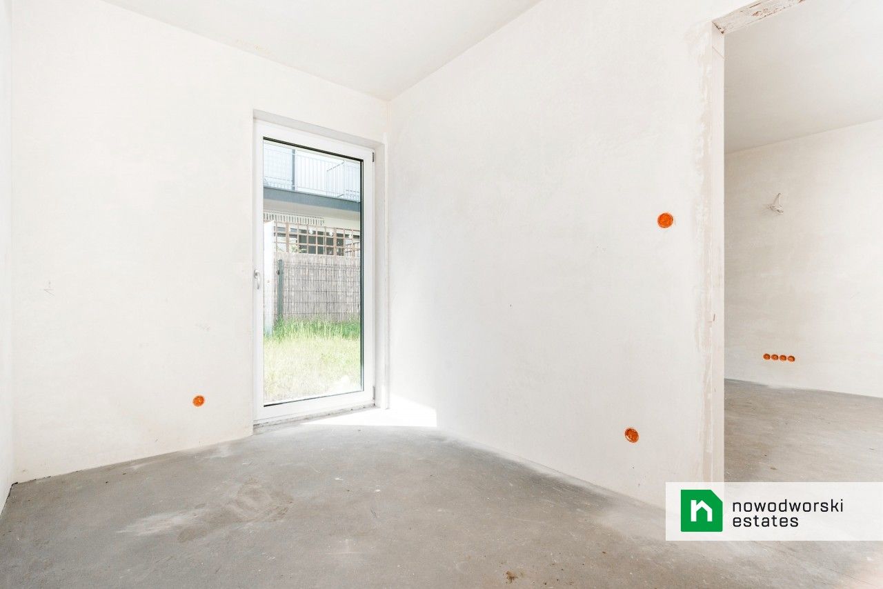 Mieszkanie w stanie deweloperskim z ogrodem na sprzedaż - Zielonki - Mieszkanie - Sprzedaż - Krakowski, Zielonki